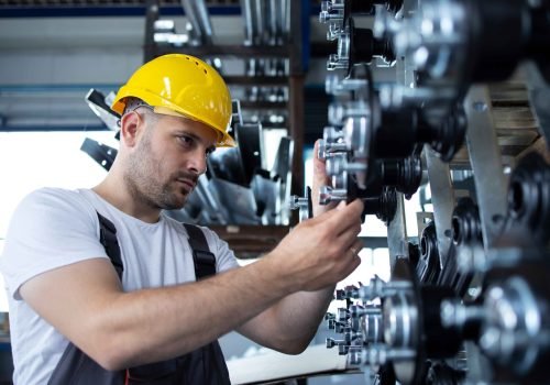industrial-worker-working-production-line-factory_11zon