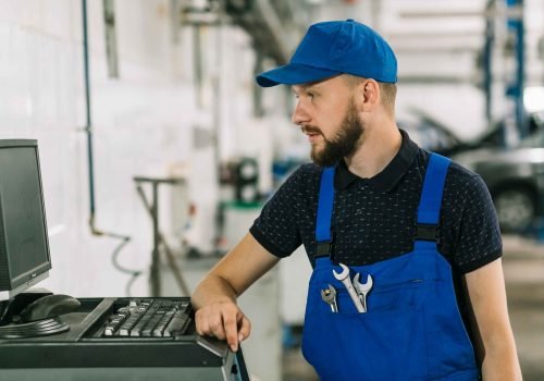 repairmen-working-with-computer_11zon
